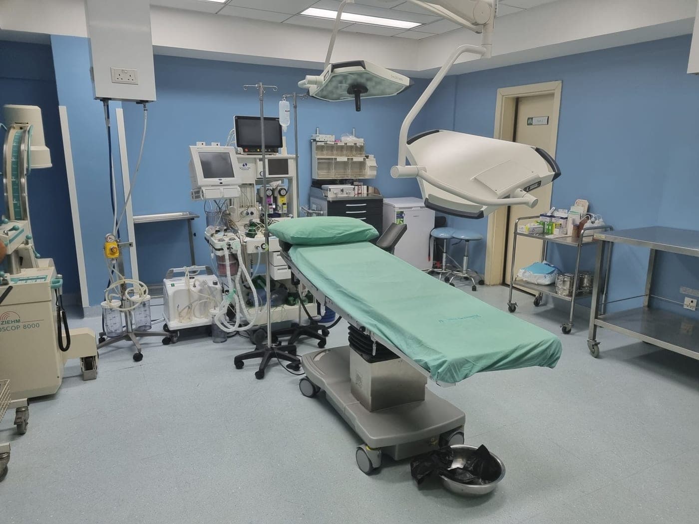 Hospital campus exterior, clinical infrastructure at scale
